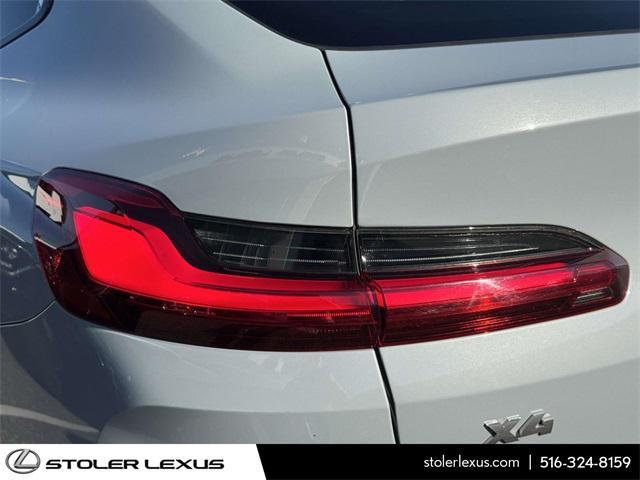 used 2023 BMW X4 car, priced at $50,000