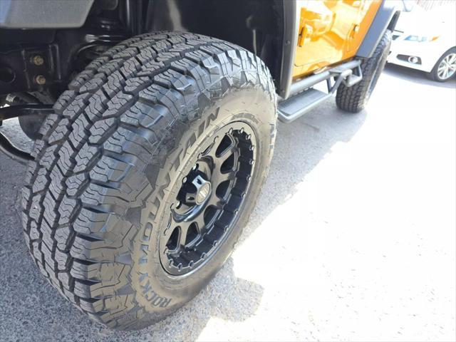 used 2014 Jeep Wrangler Unlimited car, priced at $16,499