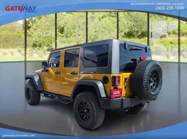 used 2014 Jeep Wrangler Unlimited car, priced at $16,499