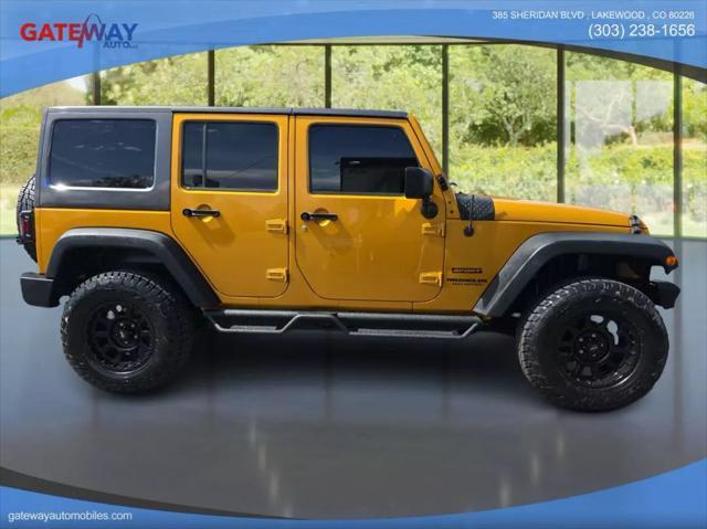 used 2014 Jeep Wrangler Unlimited car, priced at $16,499