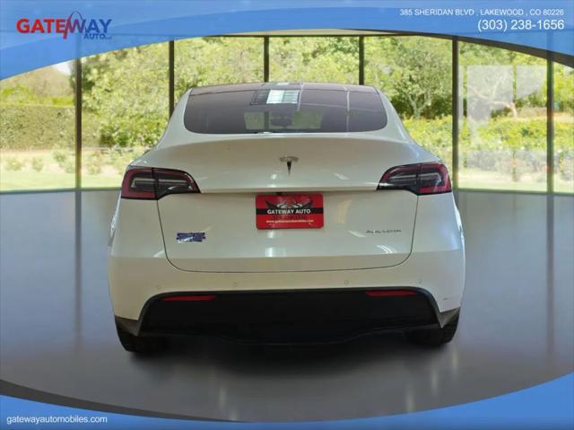 used 2021 Tesla Model Y car, priced at $27,999