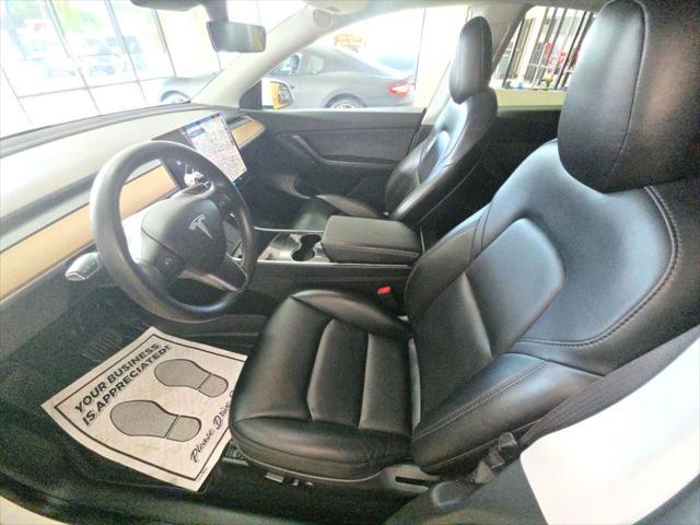 used 2021 Tesla Model Y car, priced at $27,999