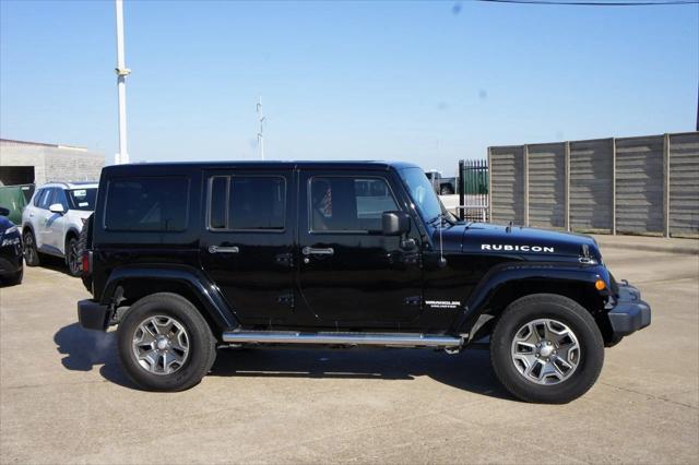 used 2013 Jeep Wrangler Unlimited car, priced at $14,987