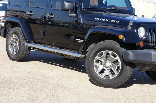 used 2013 Jeep Wrangler Unlimited car, priced at $14,987