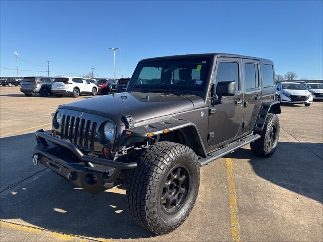 used 2012 Jeep Wrangler Unlimited car, priced at $15,997