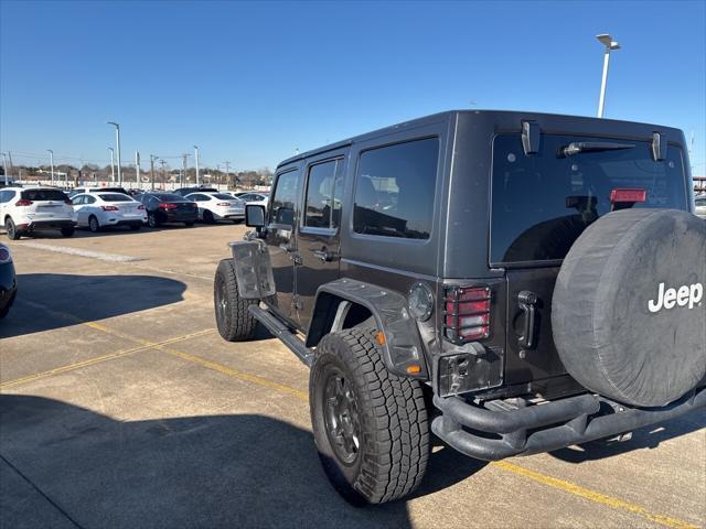 used 2012 Jeep Wrangler Unlimited car, priced at $15,997