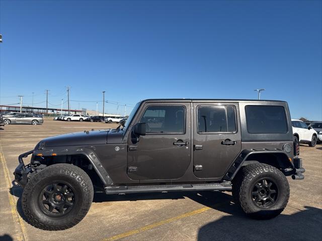 used 2012 Jeep Wrangler Unlimited car, priced at $15,997