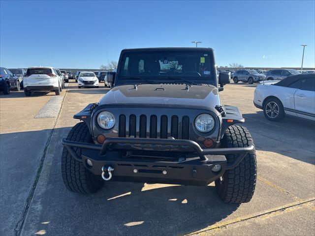 used 2012 Jeep Wrangler Unlimited car, priced at $15,997