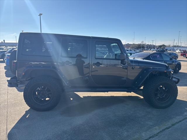 used 2012 Jeep Wrangler Unlimited car, priced at $15,997