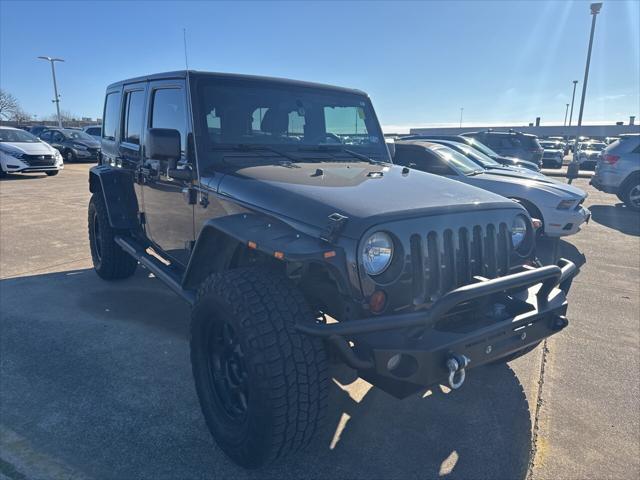 used 2012 Jeep Wrangler Unlimited car, priced at $15,997