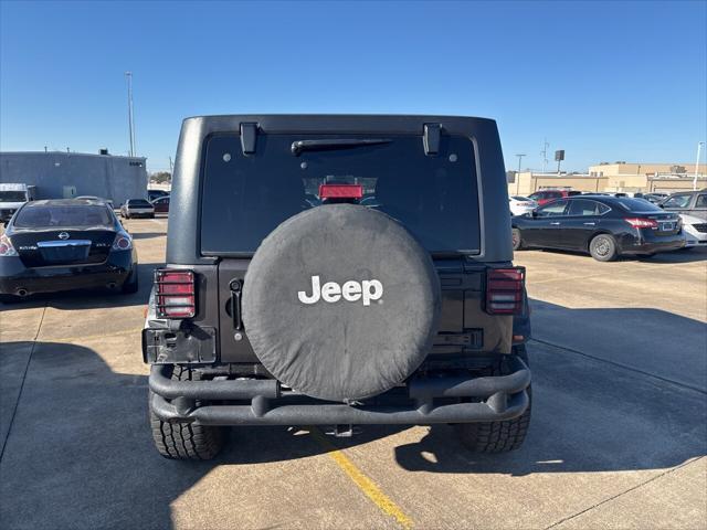 used 2012 Jeep Wrangler Unlimited car, priced at $15,997