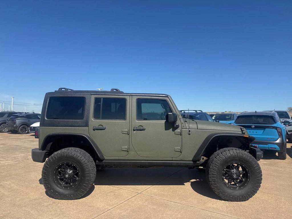 used 2015 Jeep Wrangler Unlimited car, priced at $14,448