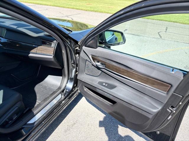 used 2015 BMW 750 car, priced at $16,999