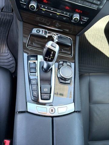 used 2015 BMW 750 car, priced at $16,999