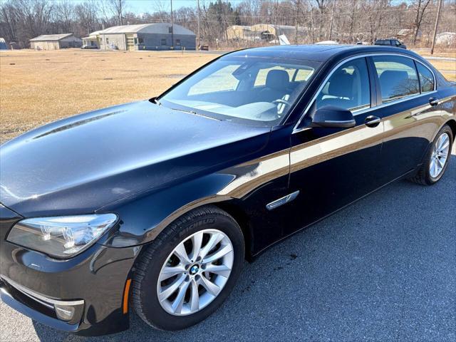 used 2015 BMW 750 car, priced at $17,999