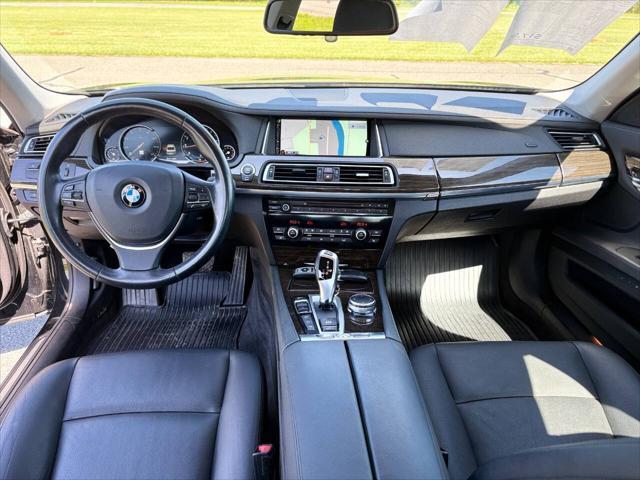 used 2015 BMW 750 car, priced at $16,999