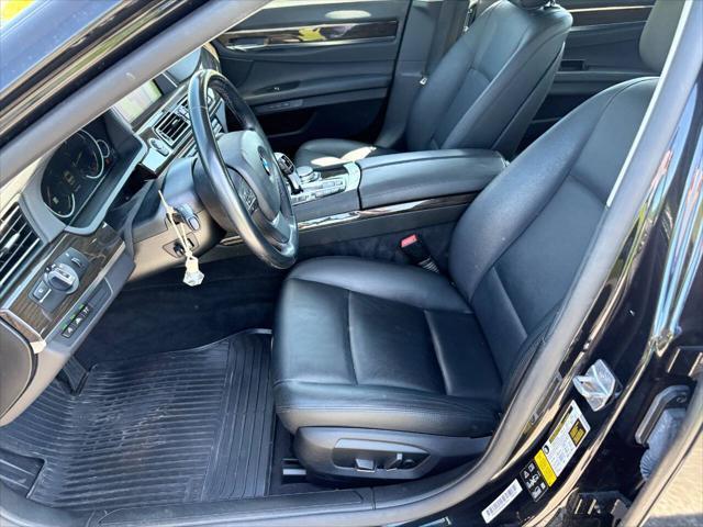 used 2015 BMW 750 car, priced at $16,999