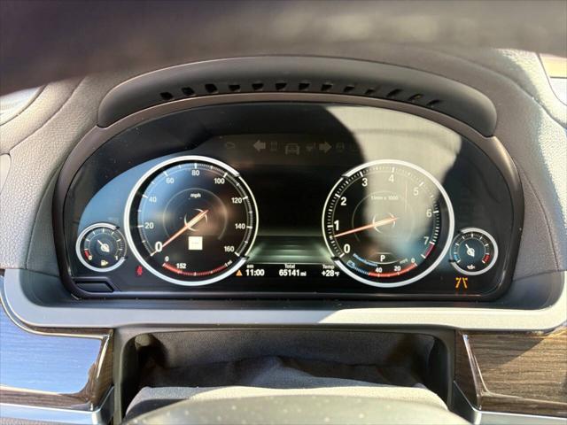 used 2015 BMW 750 car, priced at $17,999