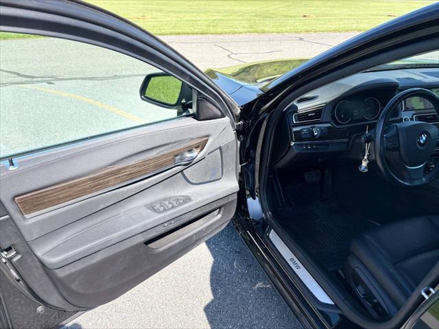 used 2015 BMW 750 car, priced at $16,999