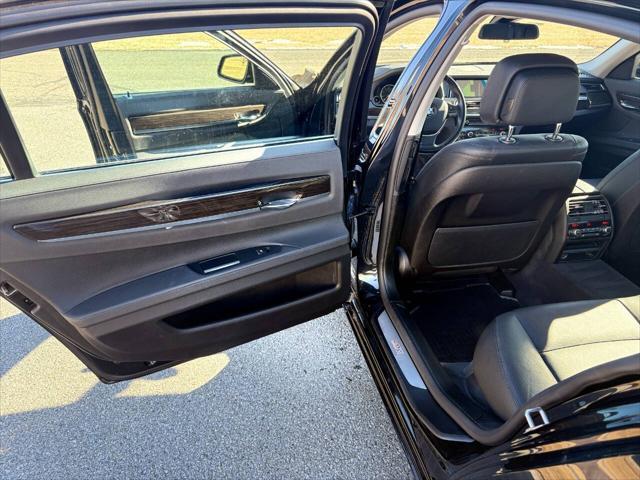 used 2015 BMW 750 car, priced at $17,999