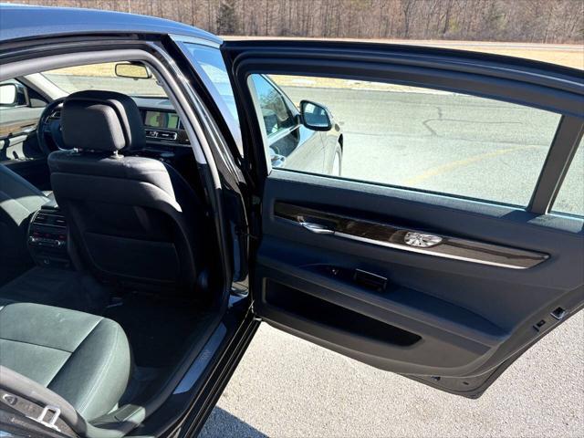 used 2015 BMW 750 car, priced at $17,999
