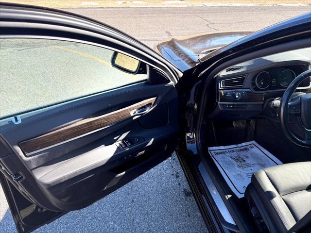 used 2015 BMW 750 car, priced at $17,999