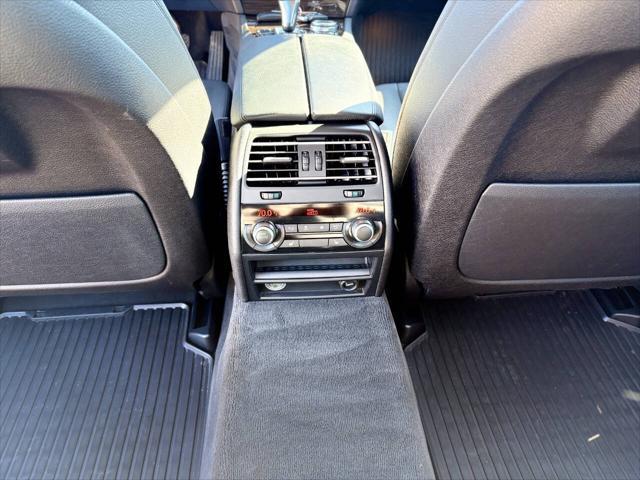 used 2015 BMW 750 car, priced at $17,999