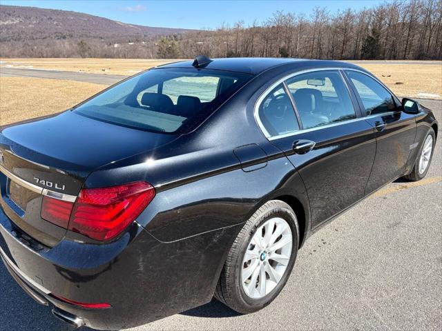used 2015 BMW 750 car, priced at $17,999
