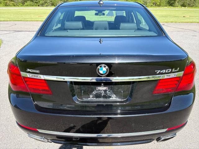 used 2015 BMW 750 car, priced at $16,999