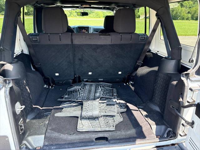 used 2013 Jeep Wrangler Unlimited car, priced at $14,999