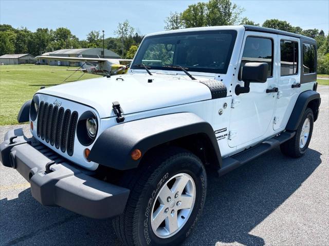 used 2013 Jeep Wrangler Unlimited car, priced at $14,999