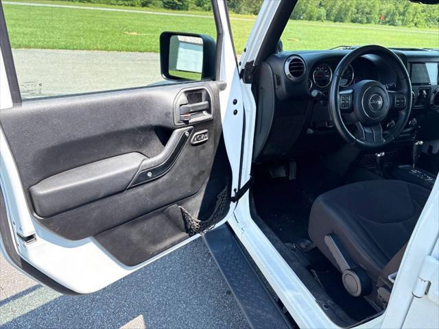 used 2013 Jeep Wrangler Unlimited car, priced at $14,999