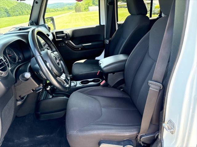 used 2013 Jeep Wrangler Unlimited car, priced at $14,999