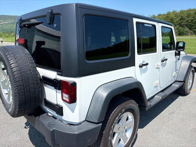 used 2013 Jeep Wrangler Unlimited car, priced at $14,999