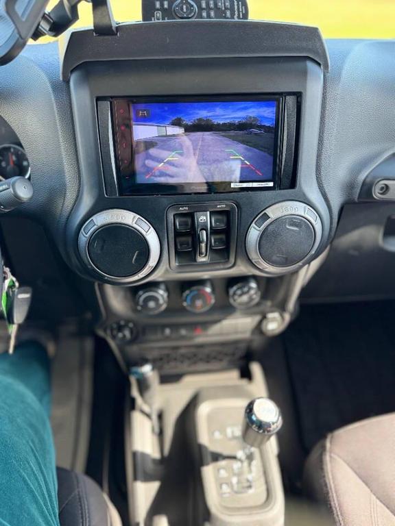 used 2013 Jeep Wrangler Unlimited car, priced at $14,499