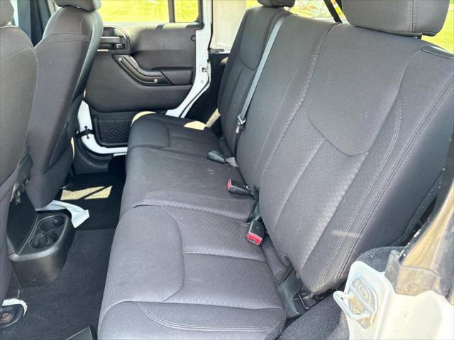 used 2013 Jeep Wrangler Unlimited car, priced at $14,999