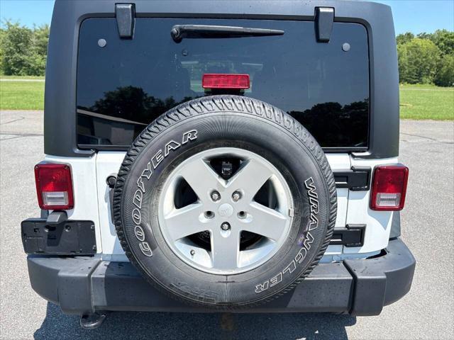 used 2013 Jeep Wrangler Unlimited car, priced at $14,999