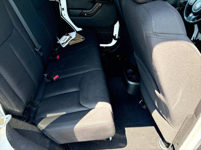 used 2013 Jeep Wrangler Unlimited car, priced at $14,999