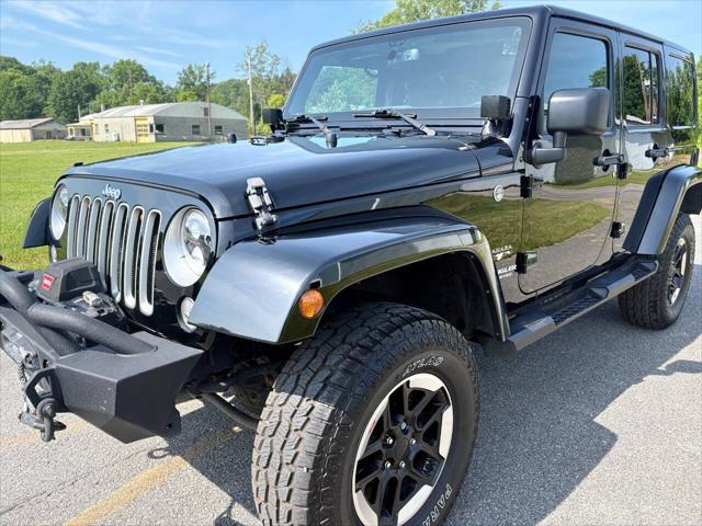 used 2016 Jeep Wrangler Unlimited car, priced at $18,499