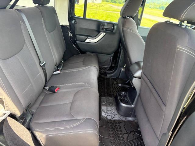 used 2016 Jeep Wrangler Unlimited car, priced at $18,499