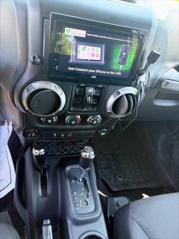used 2015 Jeep Wrangler car, priced at $15,999