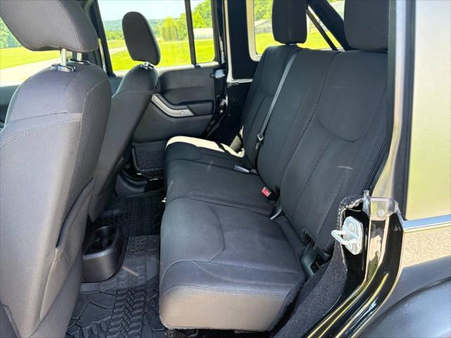 used 2015 Jeep Wrangler car, priced at $15,999