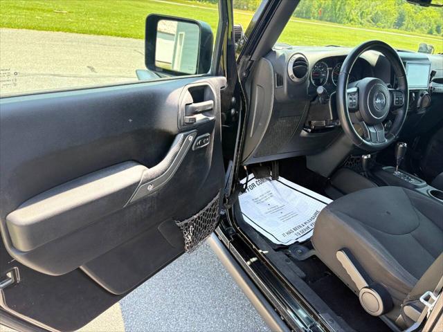 used 2015 Jeep Wrangler car, priced at $15,999