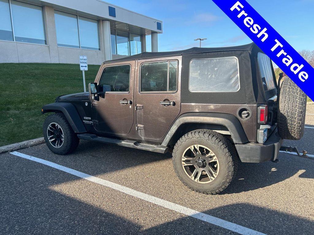 used 2013 Jeep Wrangler Unlimited car, priced at $13,990