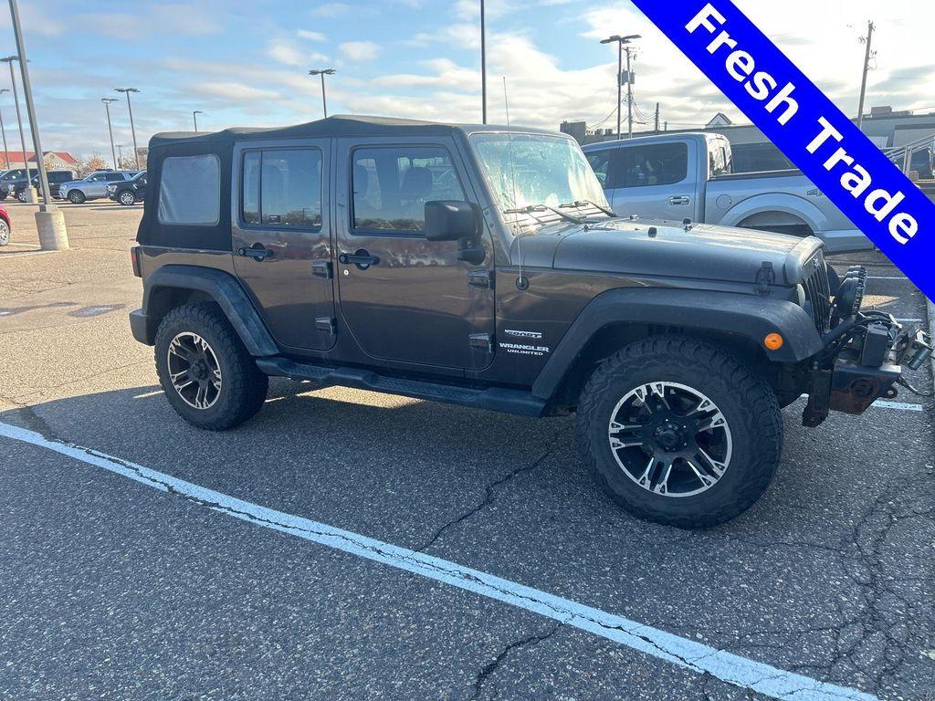 used 2013 Jeep Wrangler Unlimited car, priced at $13,990