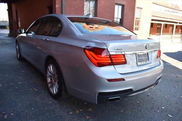 used 2015 BMW 750 car, priced at $18,490