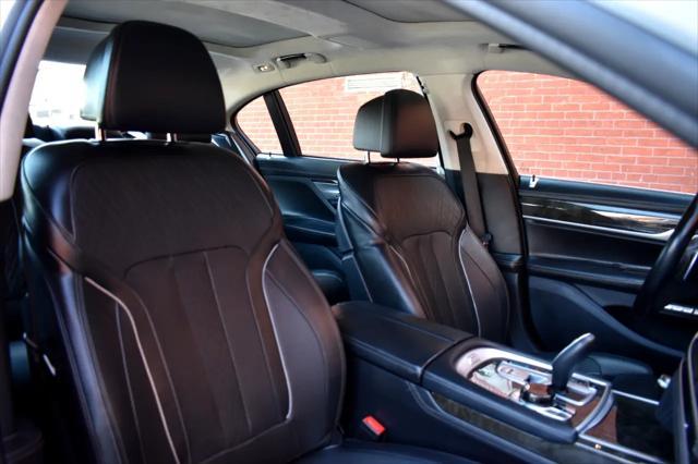 used 2016 BMW 750 car, priced at $21,990