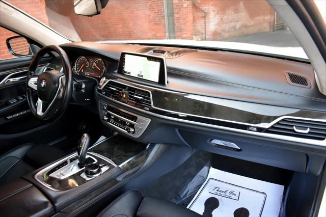 used 2016 BMW 750 car, priced at $21,990