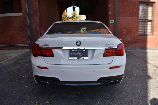 used 2014 BMW 750 car, priced at $16,990