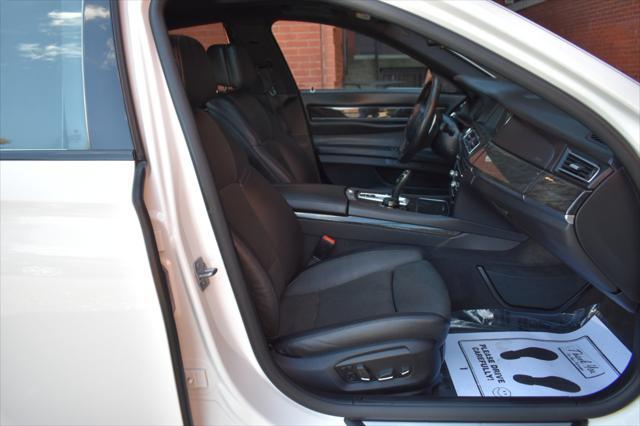 used 2014 BMW 750 car, priced at $16,990